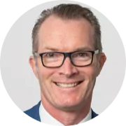 Close-up photograph of Patrick Coveney's face