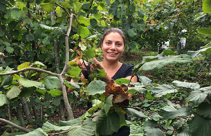 Burcu Turkay visiting nuts farm