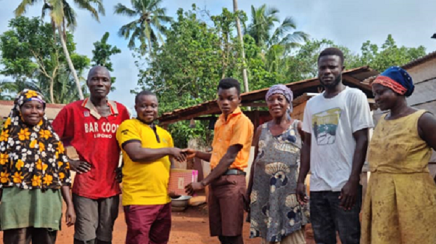 Bright with his family, receiving school supplies