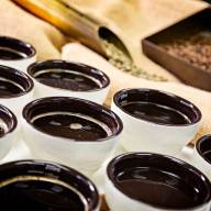 Cups filled with dark liquid chocolate