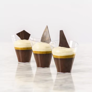 Three dessert cups filled with chocolade and cream