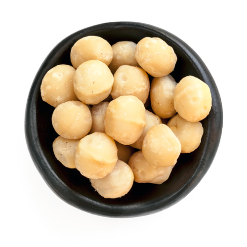 Close up shot of macadamias in a small bowl