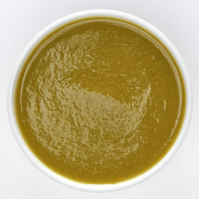 Close up shot of a green sauce