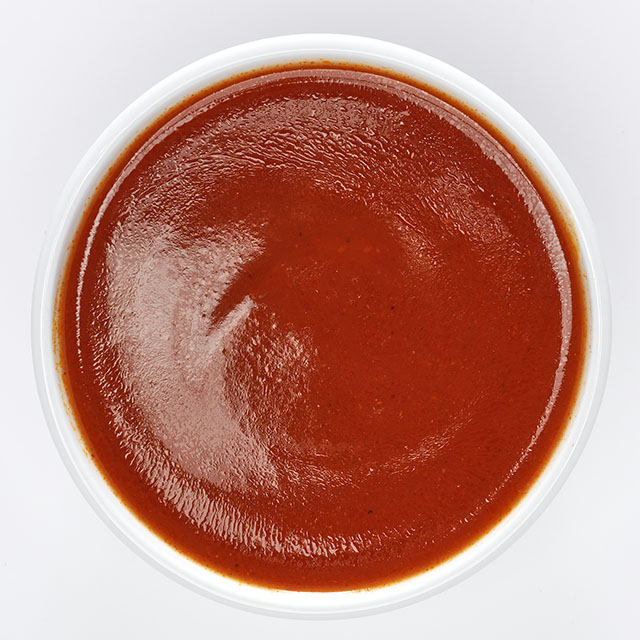 Close up shot of a red sauce